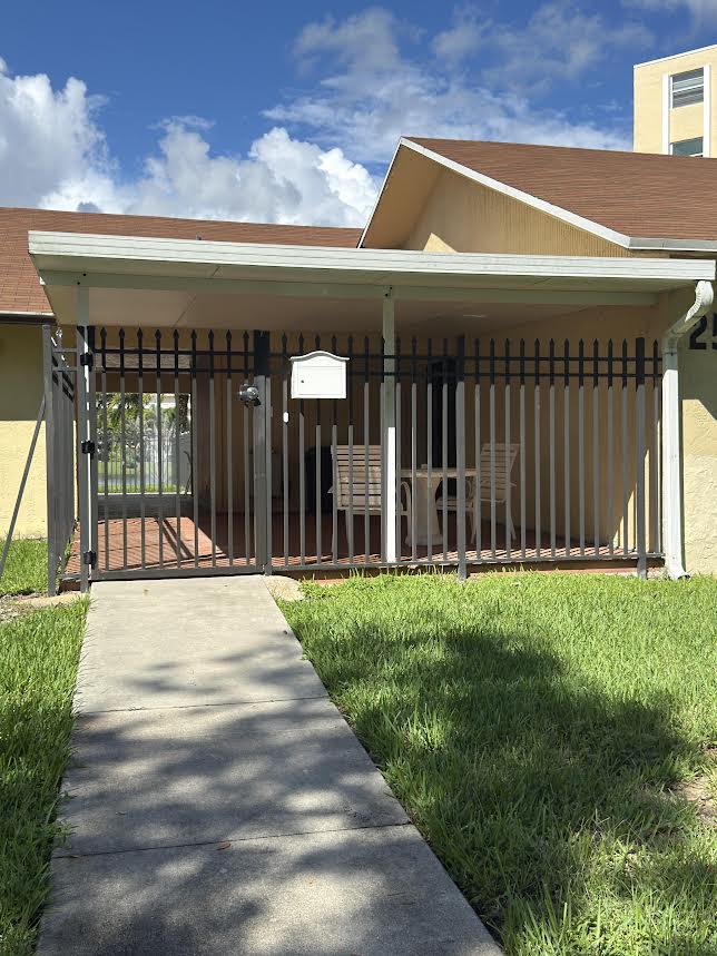 HOA community fence installation meeting neighborhood guidelines and uniform standards