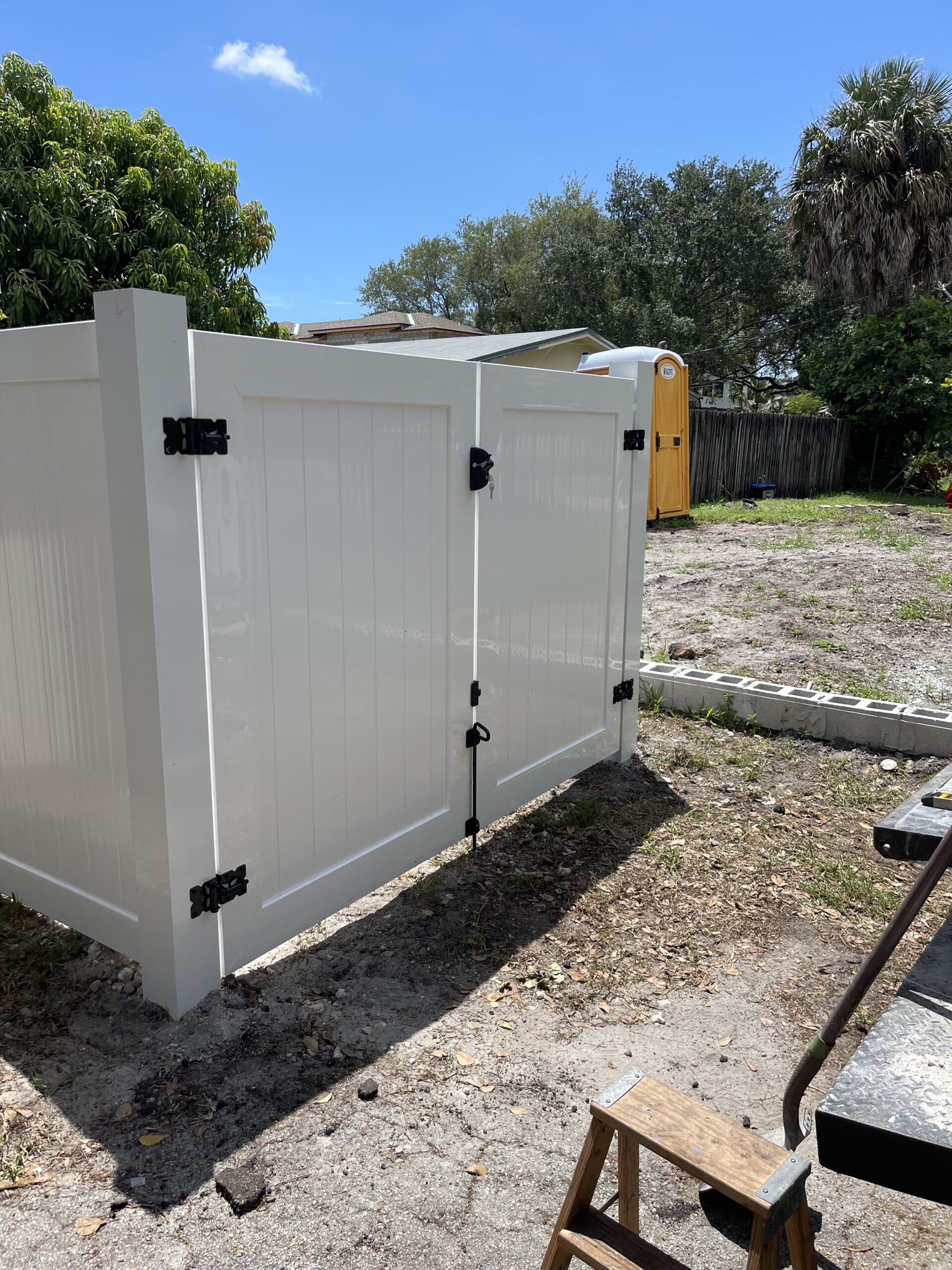 Privacy fence with double gate installation