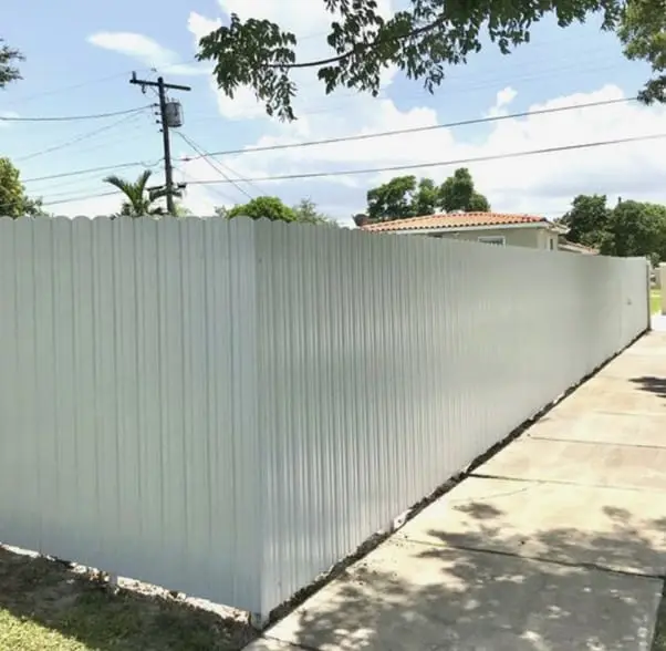 Residential steel panel fence installation