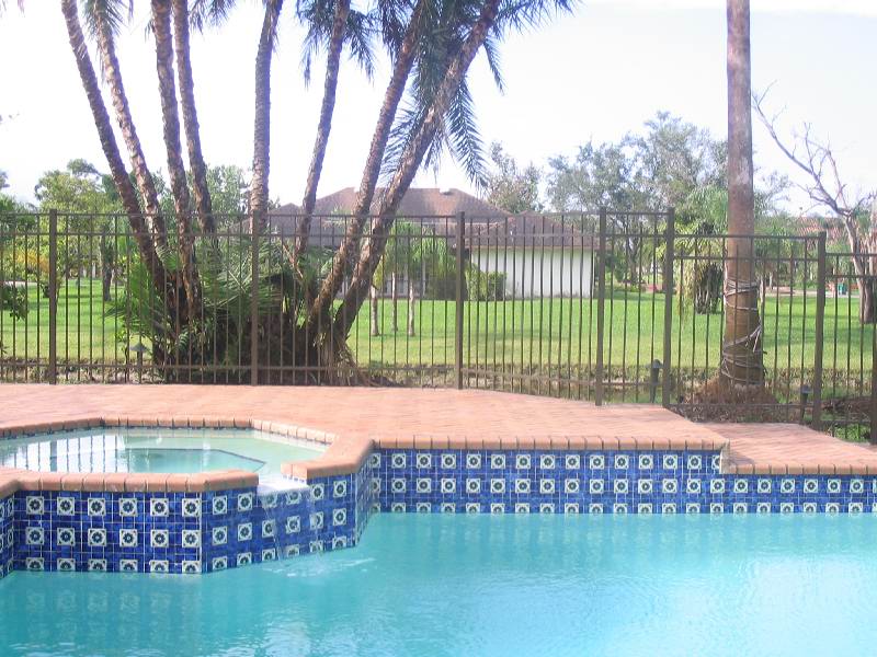 Aluminum pool fence installation in Fort Lauderdale for decorative pool fencing, safety gates, and secure backyard pool areas