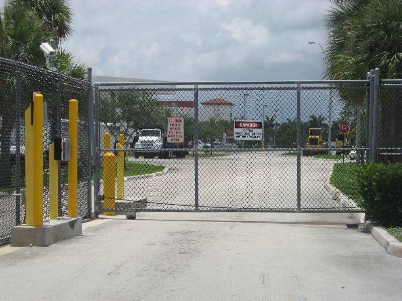 Commercial fence repairs for damaged sections, leaning posts, and gate hardware issues