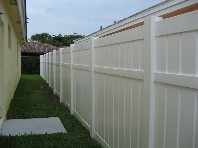 PVC semi-private fence installation
