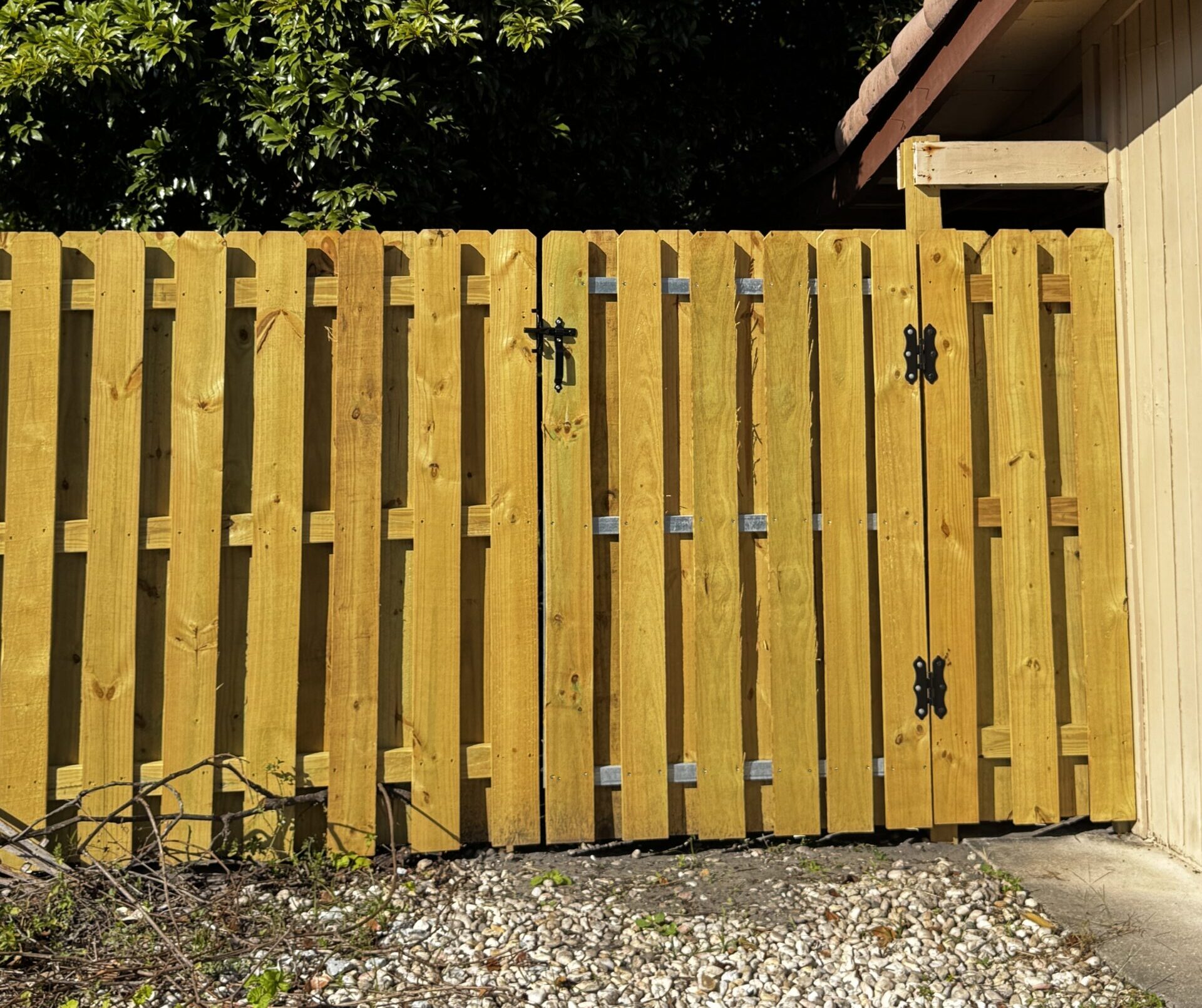 Wood shadowbox privacy fence installation in Fort Lauderdale for residential backyards, side yards, gates, and custom wood fence layouts