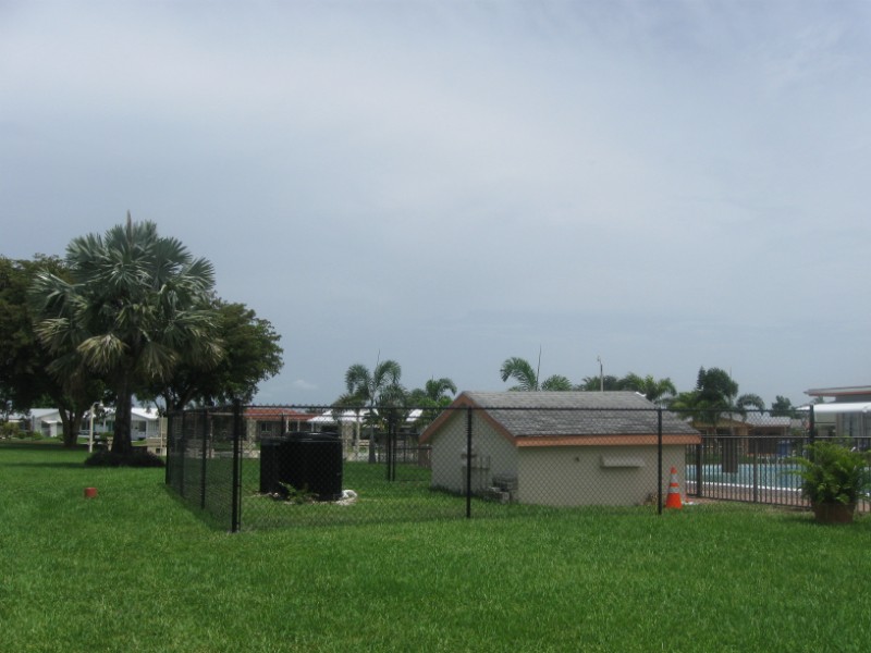 Residential black chain link fence installation in Fort Lauderdale for homes, yards, pool areas, and secure property lines