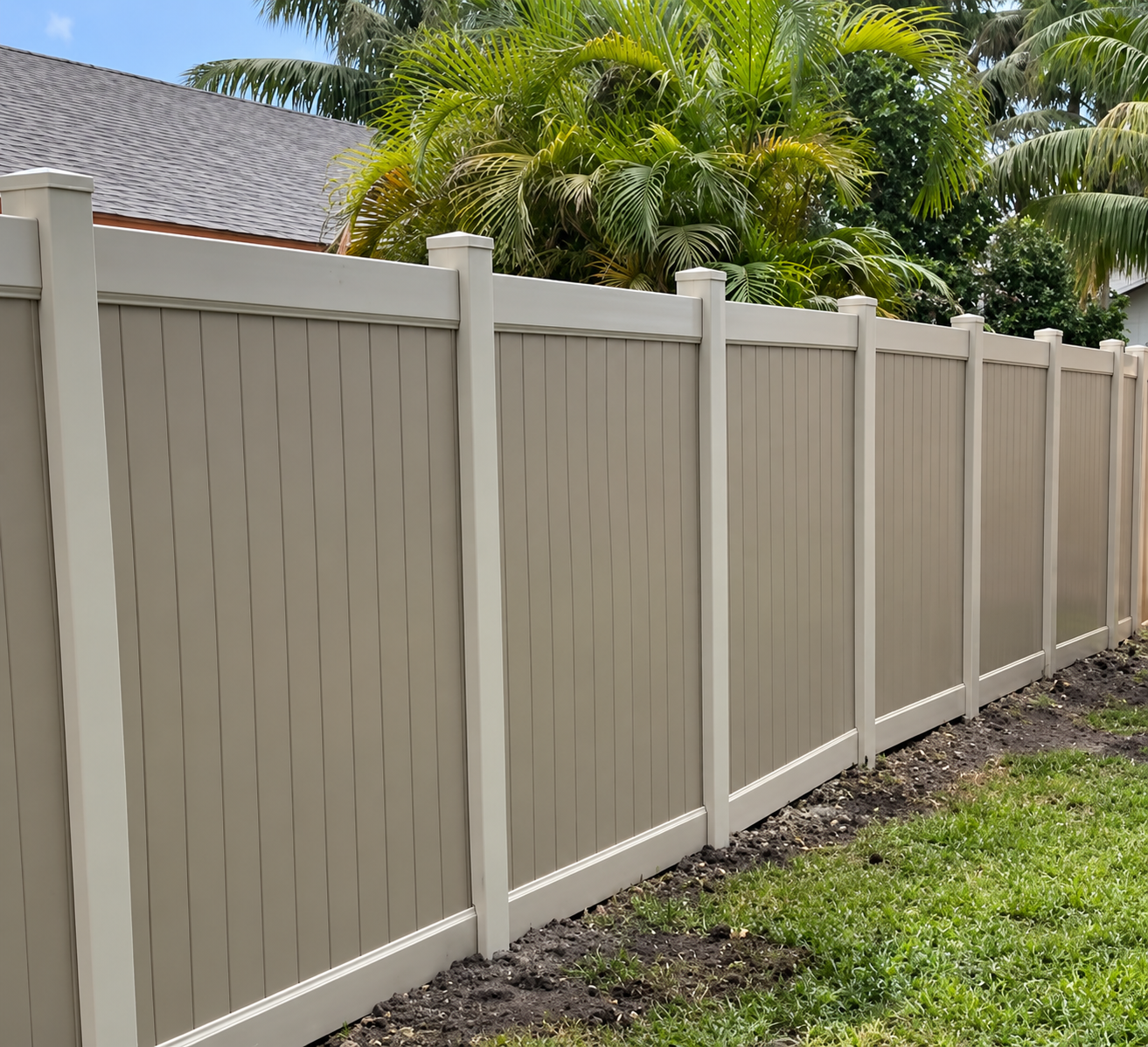 Board-on-board PVC vinyl privacy fence installation with a clean low-maintenance solid barrier